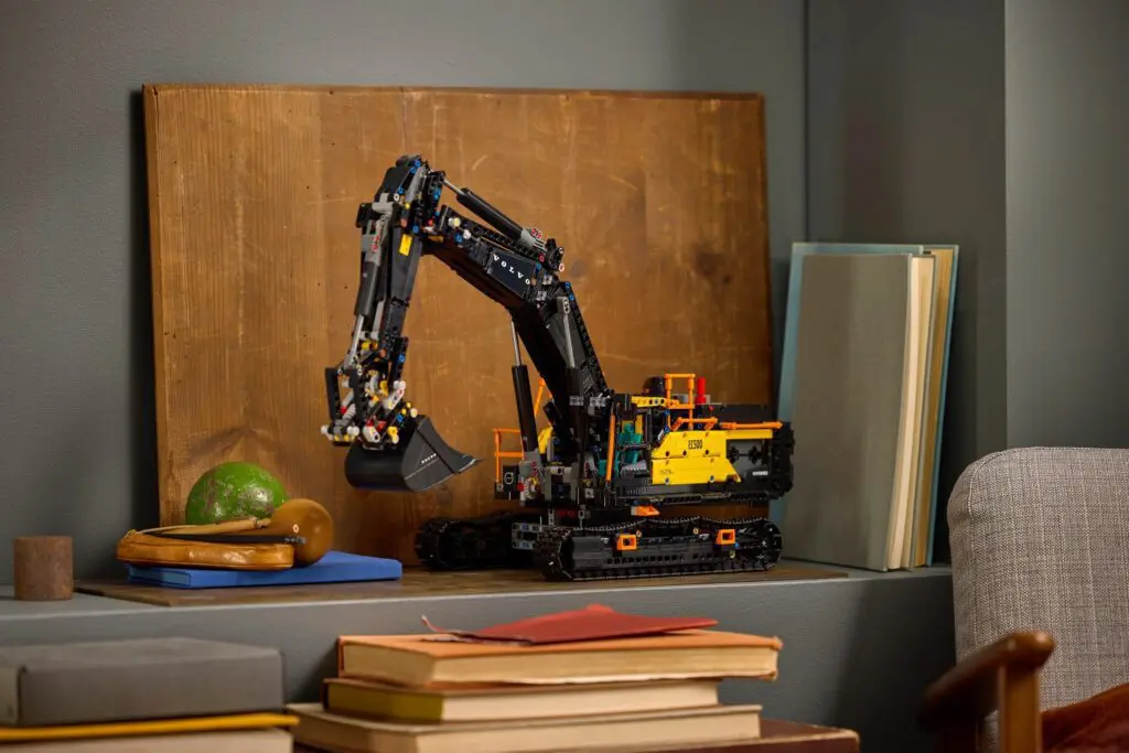 Miniature excavator with books and decor