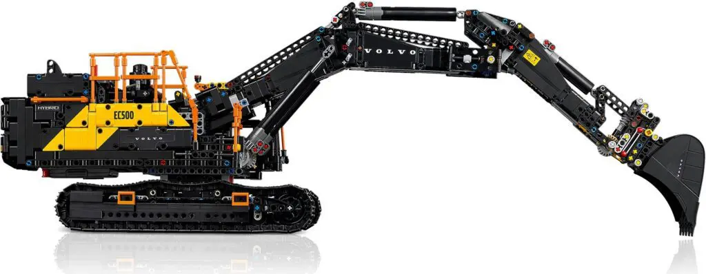 Toy excavator model with black and yellow design.