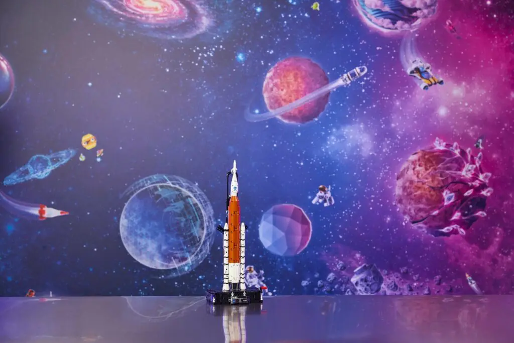 Toy rocket with colorful space backdrop