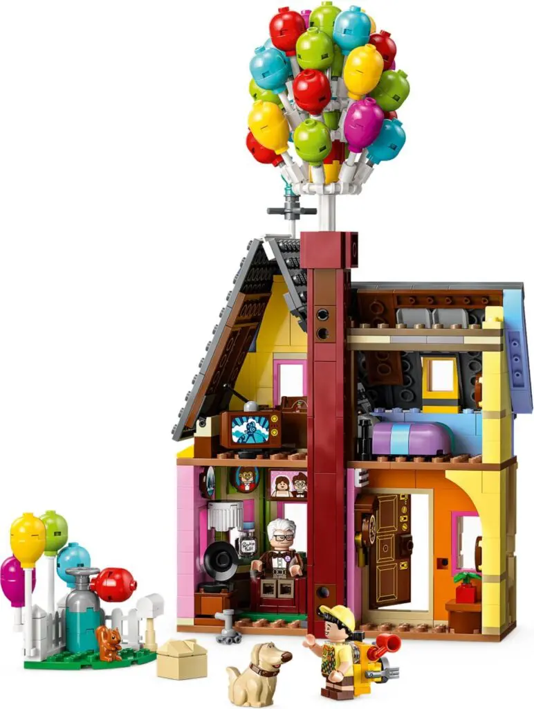 Miniature house with vibrant balloons