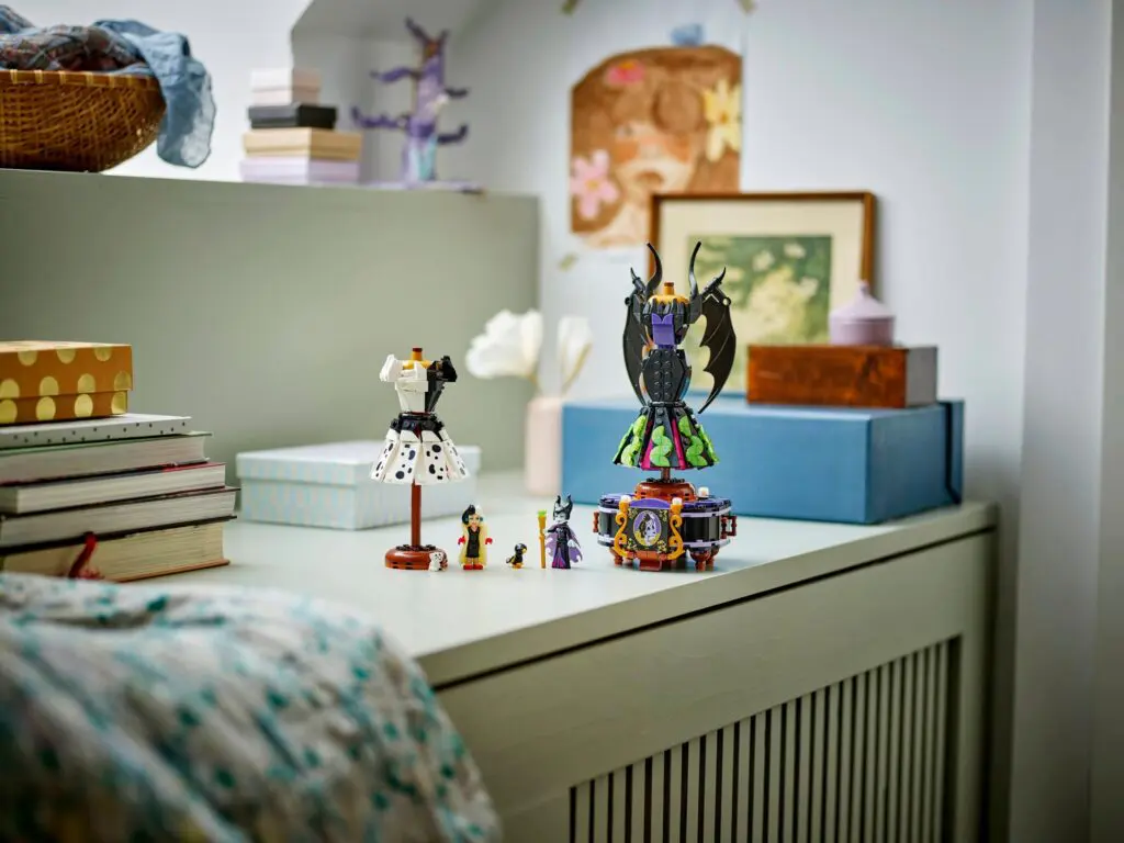 Decorative desk with books and figures