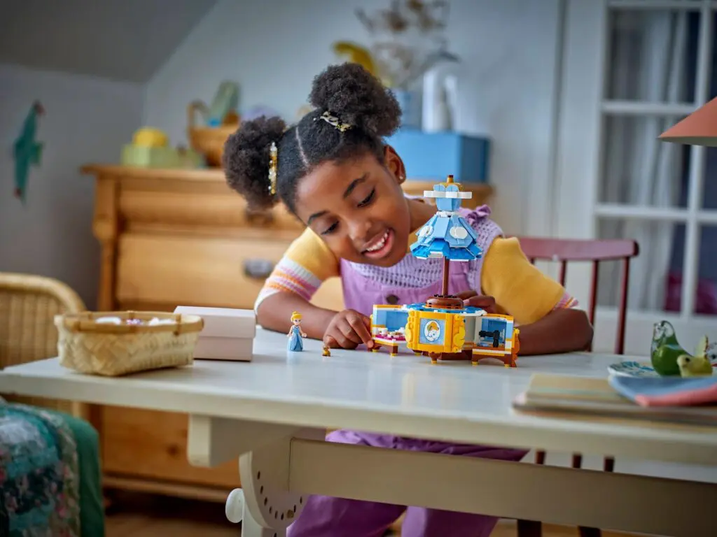 Young child enjoying creative playtime at home.