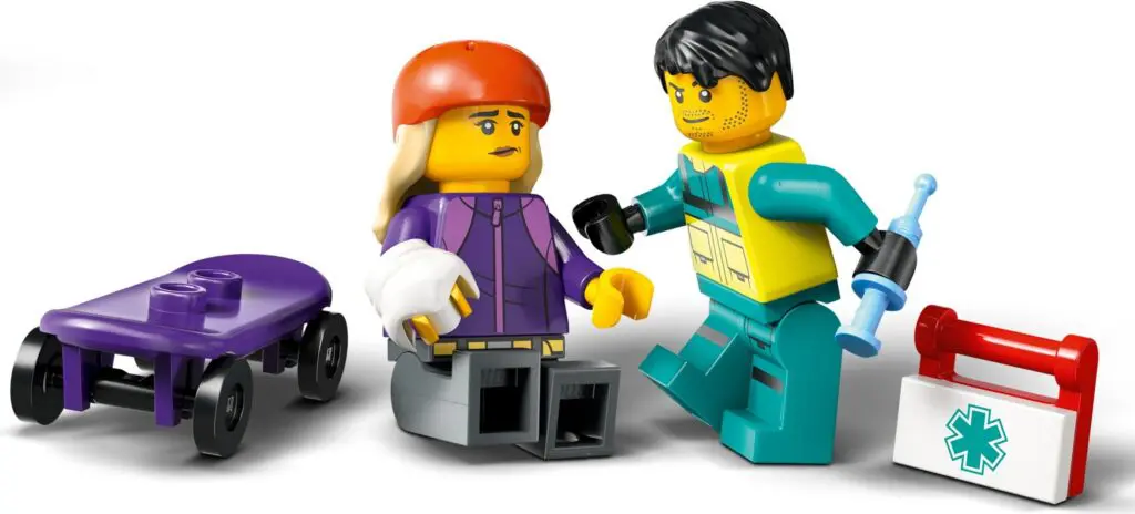 Toy scene with injured LEGO skateboarder