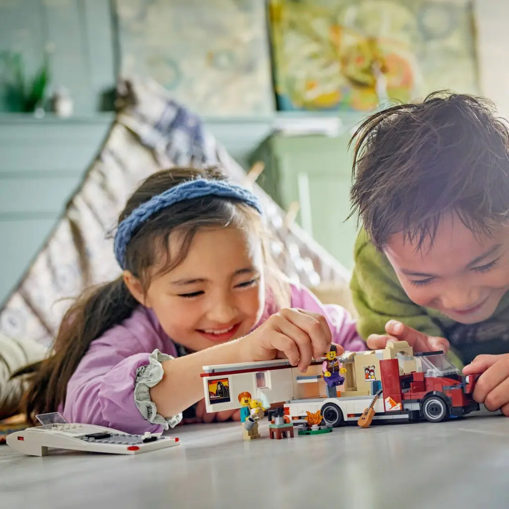 Kids enjoying toy vehicles together