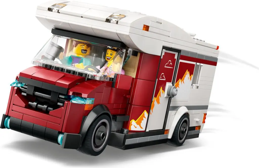 Toy camper van with minifigures
