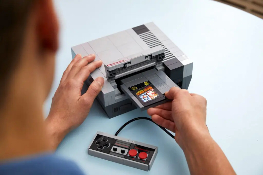 Retro gaming with NES and controller replica.