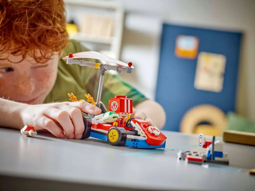 Kid enjoying colorful building blocks