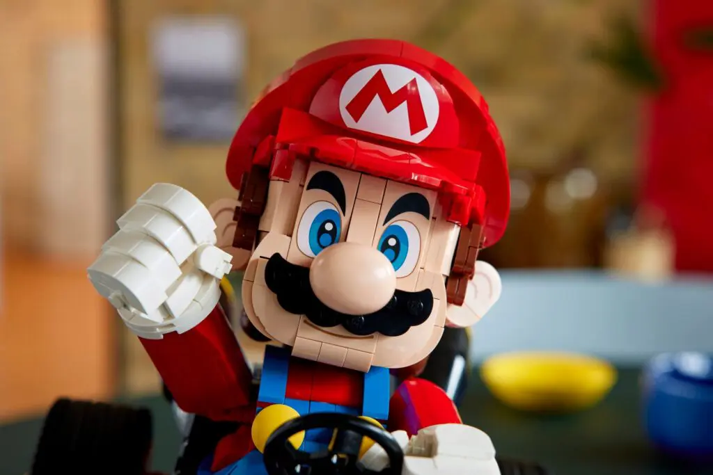 LEGO Mario figure driving a kart