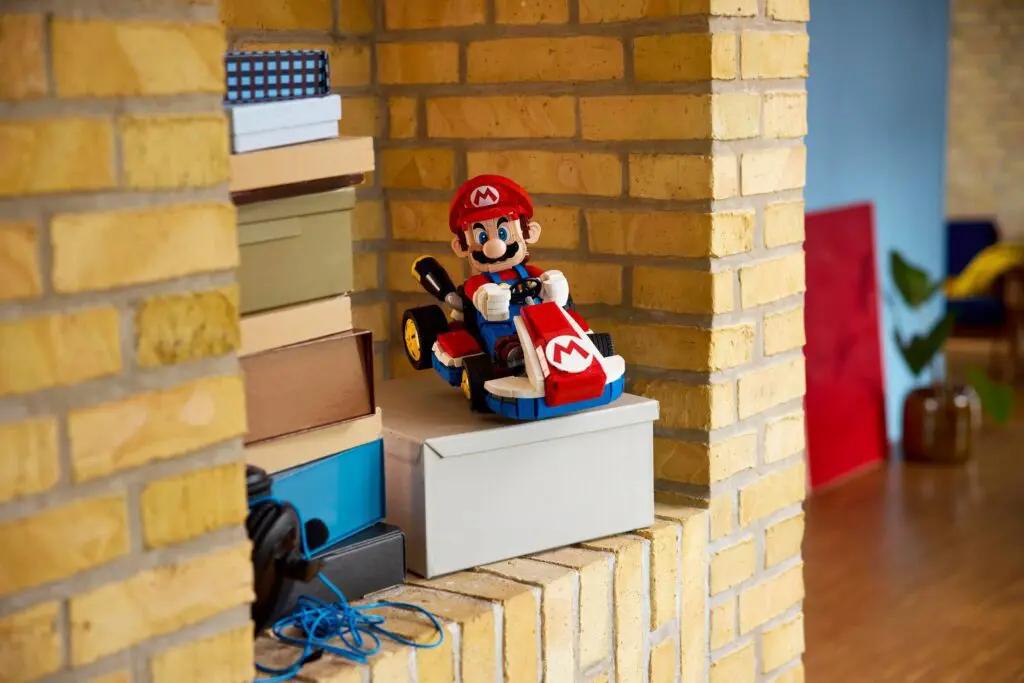 Toy kart on brick shelf