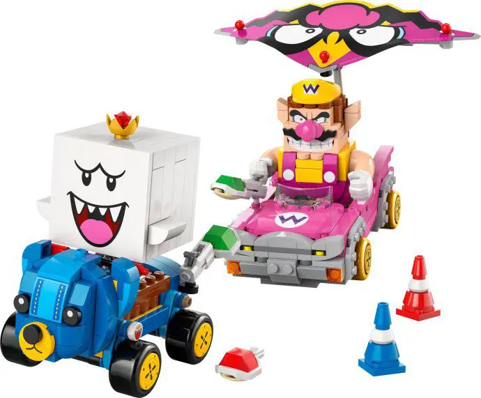 Toy vehicles with characters and traffic cones.