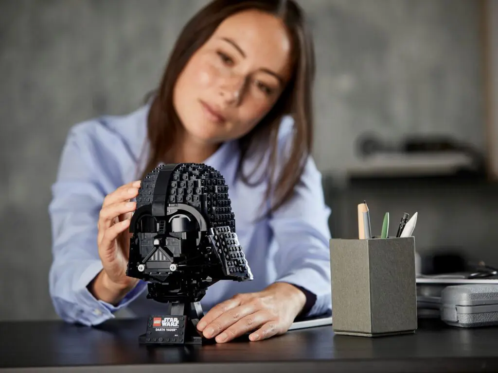 Woman focused on LEGO project