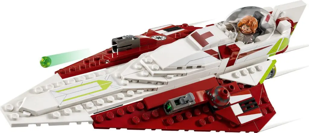 Building toy spaceship with green laser