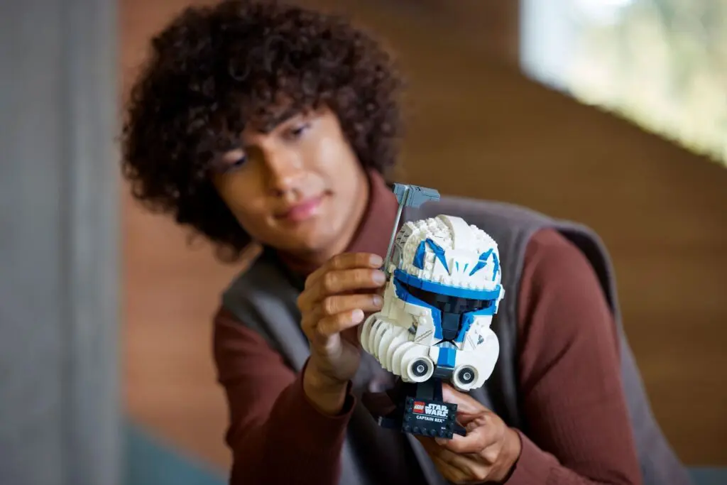 Enthusiast showing off LEGO collectible helmet