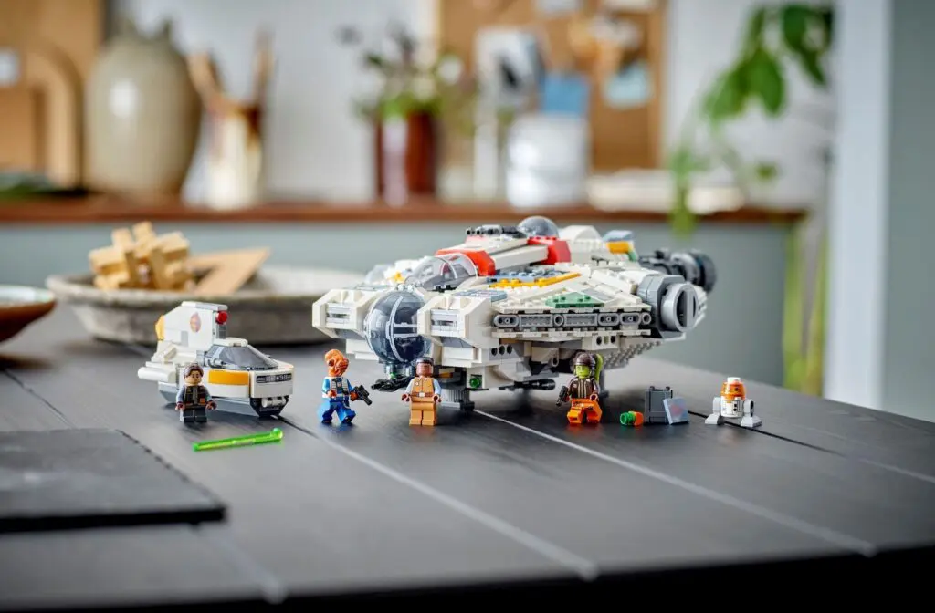 LEGO spaceship with mini-figures on table
