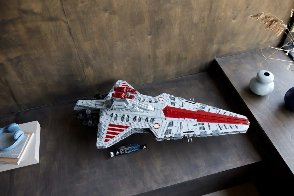 Lego spaceship model on a wooden surface
