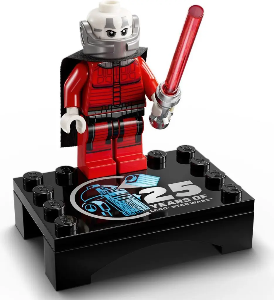 Red-caped LEGO minifigure on display stand
