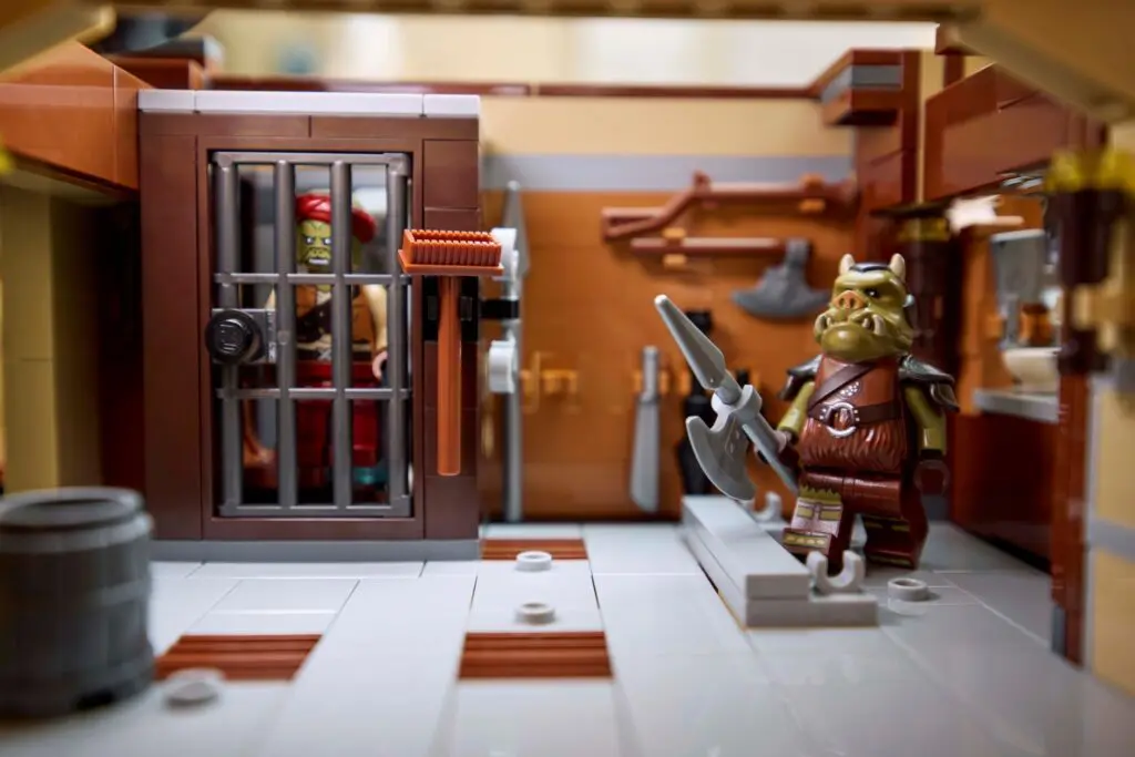 Fantasy LEGO scene with figures and weapons