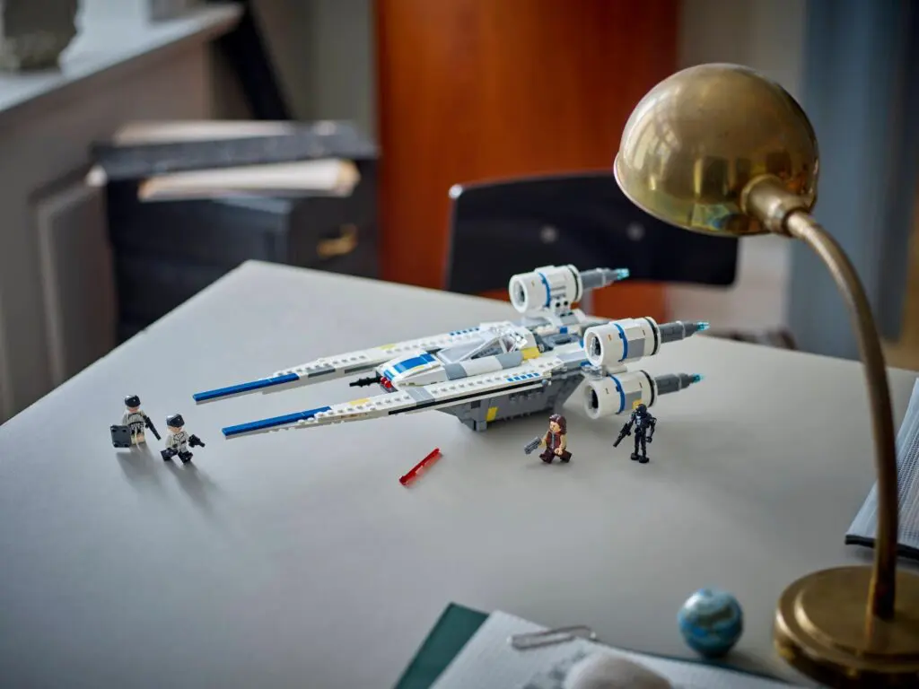 Lego spaceship and figures on desk