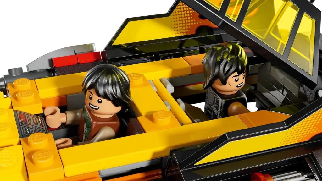 Toy characters driving a LEGO vehicle