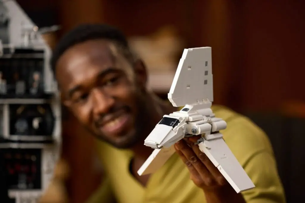Man holding a spaceship model