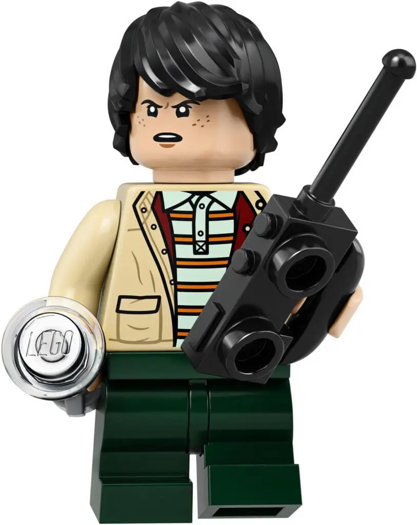 Toy figure with striped shirt and camera