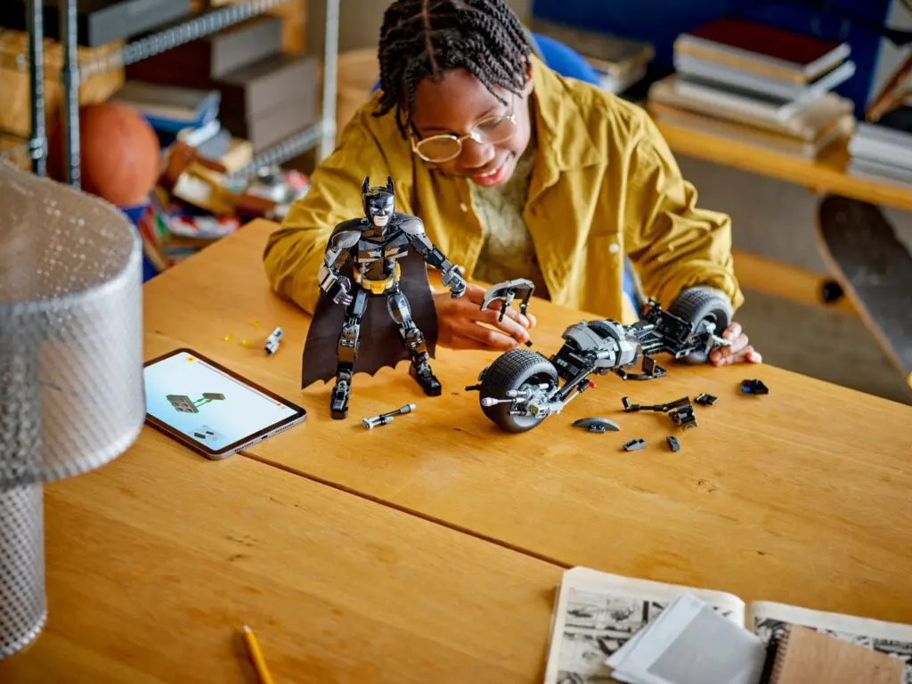 Building action figures on wooden table
