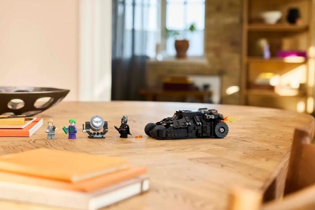 Mini Batmobile and figures in cozy room
