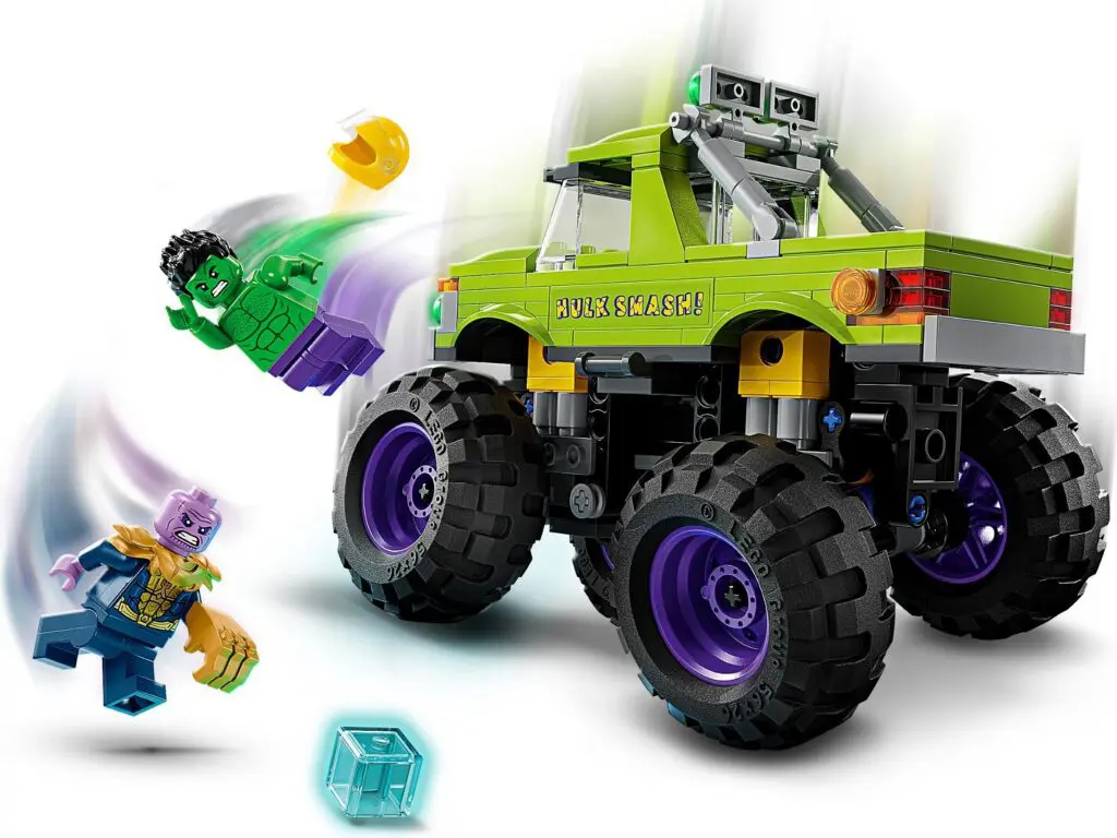 Toy monster truck with superhero figures