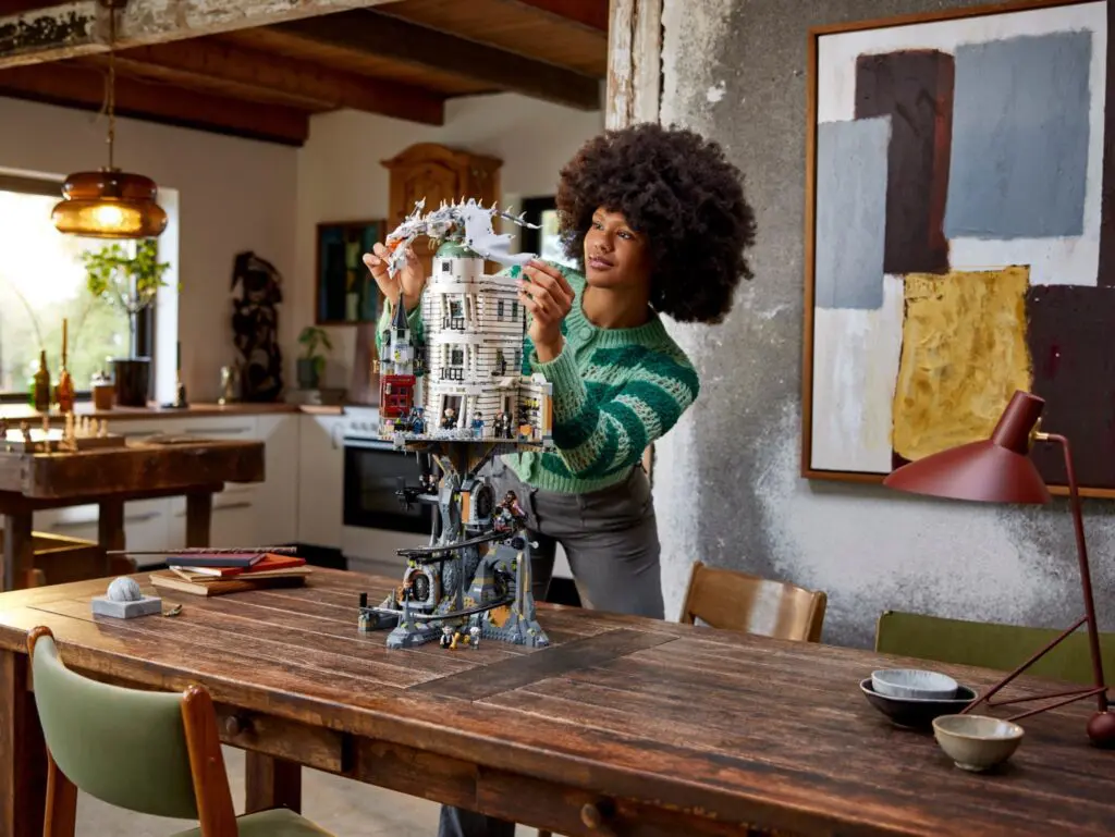 Building LEGO set in cozy living room