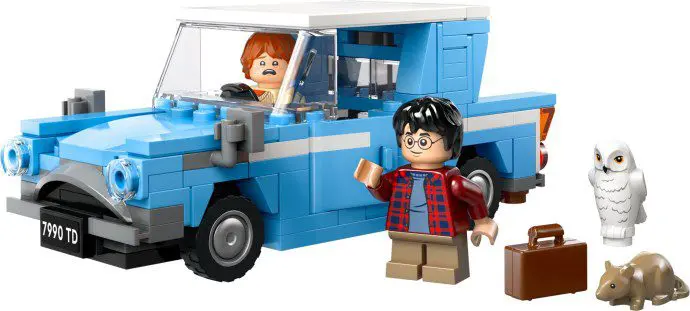 Lego characters beside blue vehicle and owl