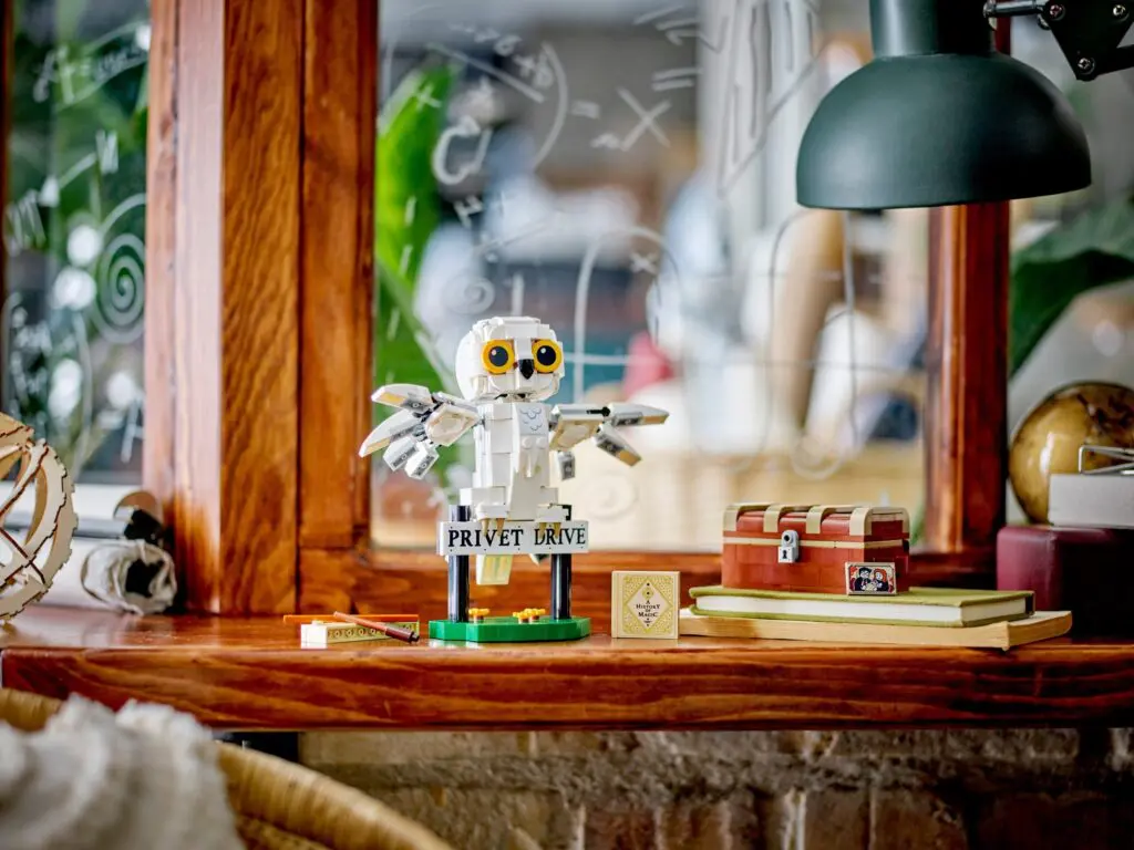 LEGO owl figurine on wooden shelf