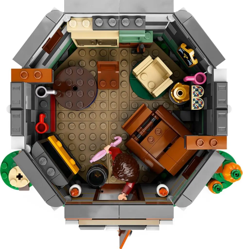 LEGO cabin interior with various furnishings.