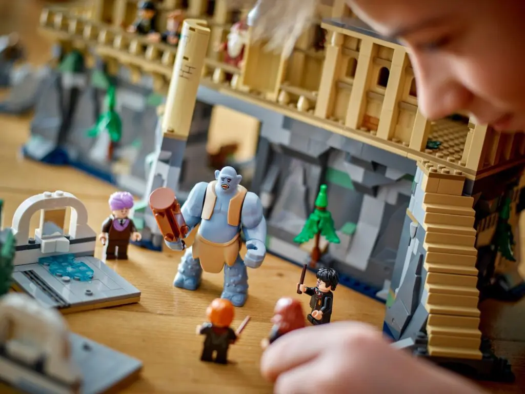 Child playing with fantasy building blocks