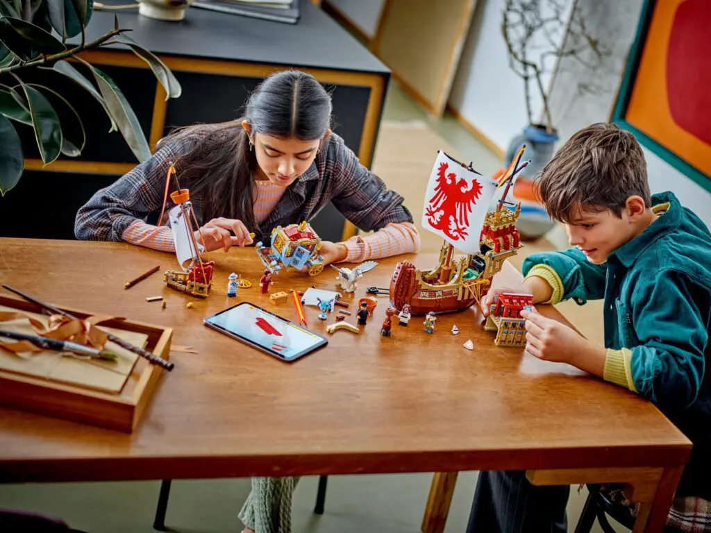 Kids assembling model ships indoors