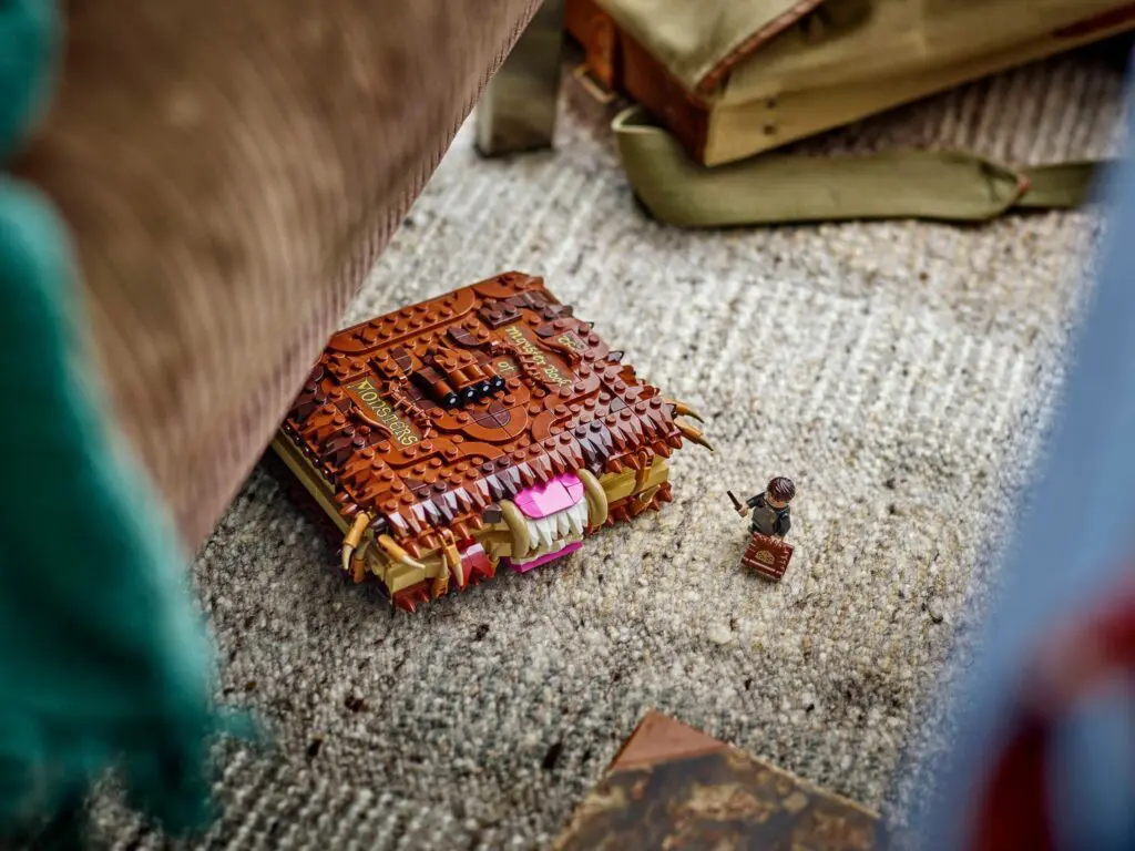 Toy book with minifigure on floor