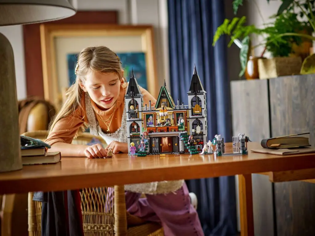 Girl enjoying a castle toy set
