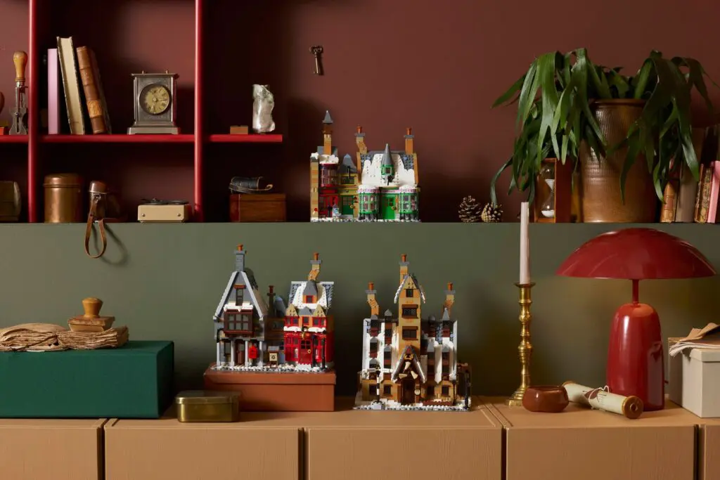 Miniature houses on a decorated shelf