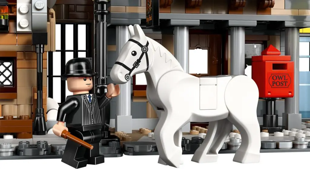 Toy figure beside horse and postbox