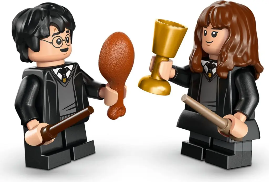 Mini figures in black robes with accessories