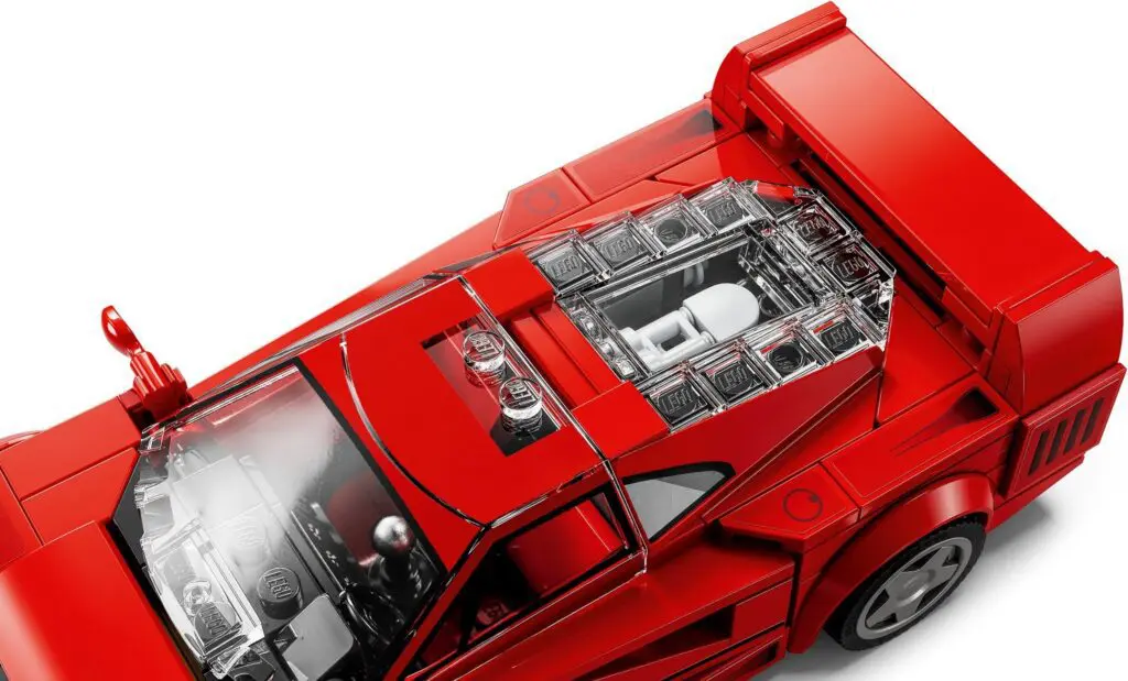Red toy car with visible engine details