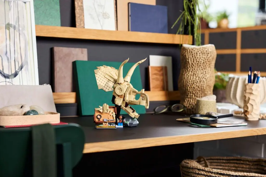Stylish workspace with dinosaur figurine