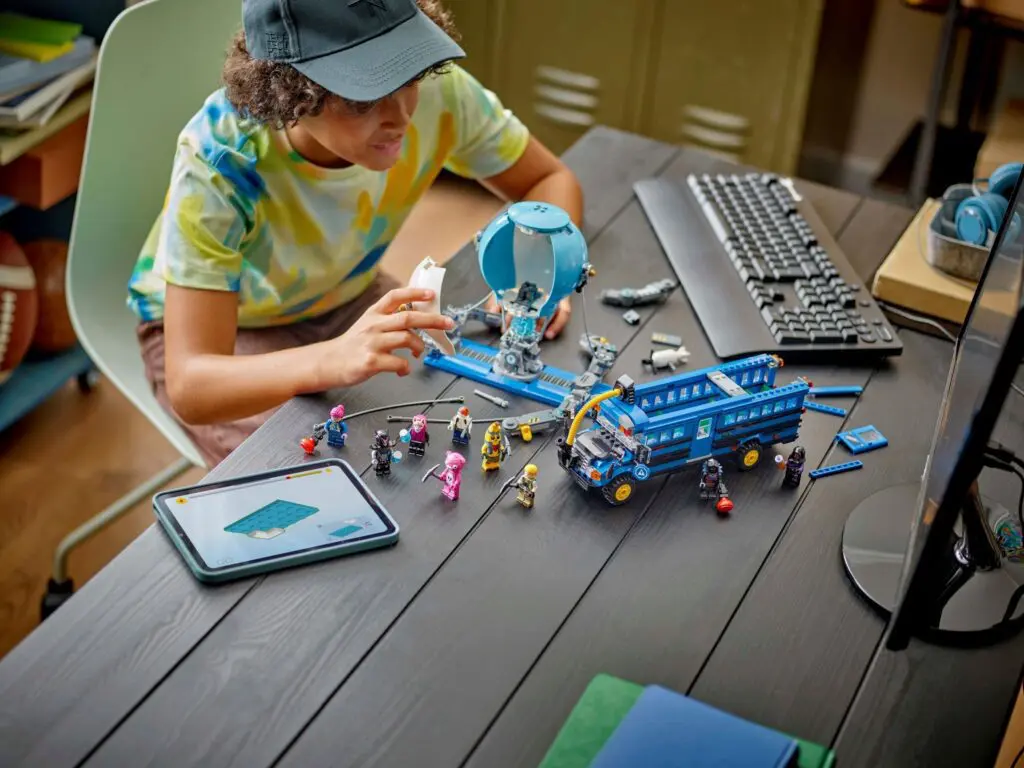 Boy engaged with construction toys indoors.