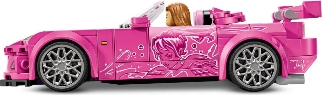 Pink toy car with graphics