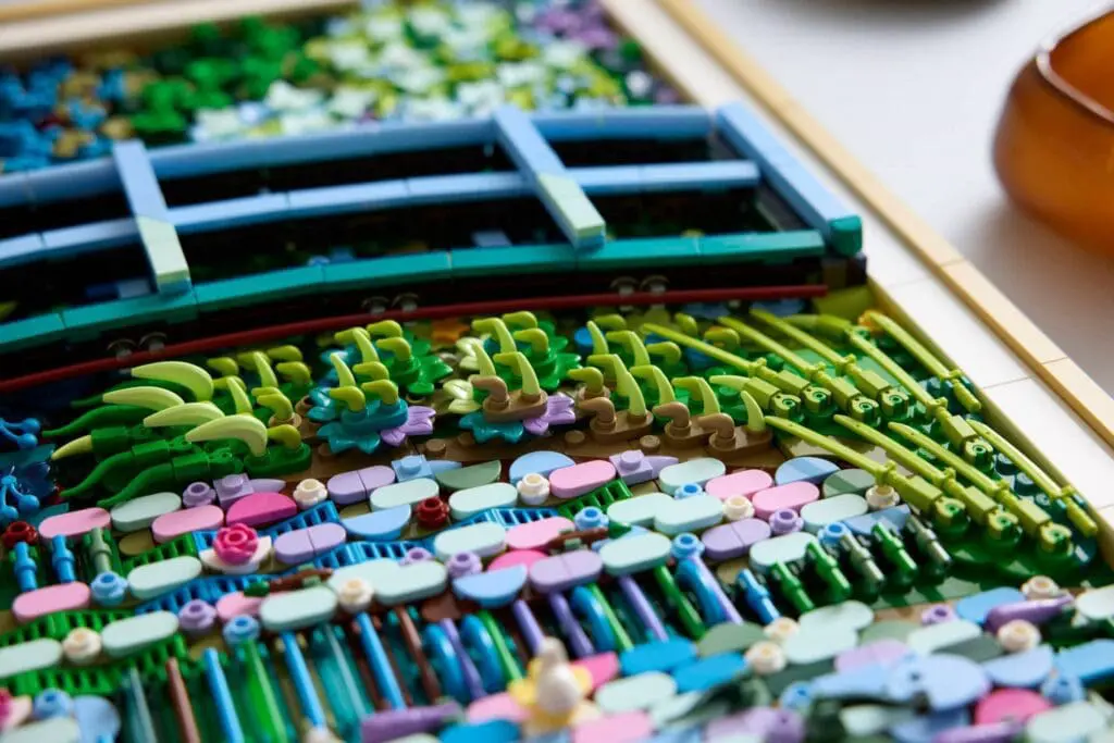 Artistic mosaic with floral and bridge elements