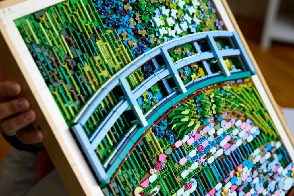 Intricate mosaic featuring a curved bridge