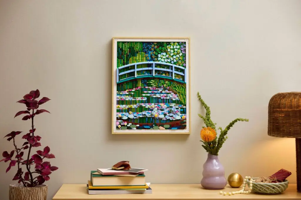 Framed painting above decorated wooden table