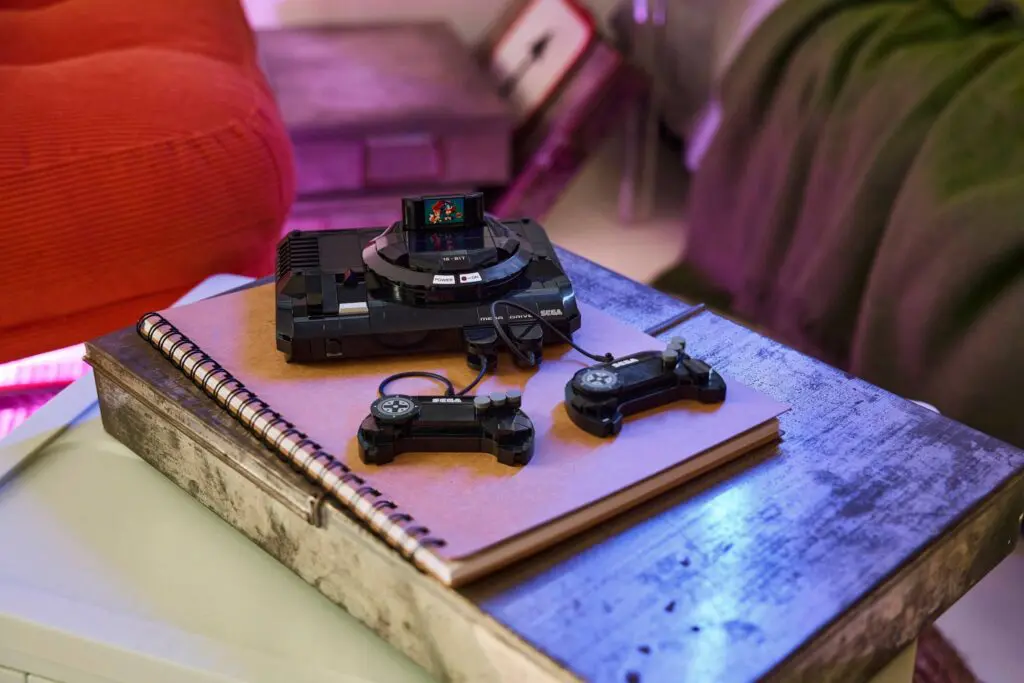 Retro gaming console with controllers on table
