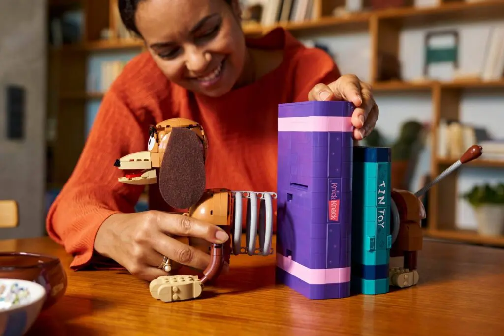 Person enjoying a creative toy project