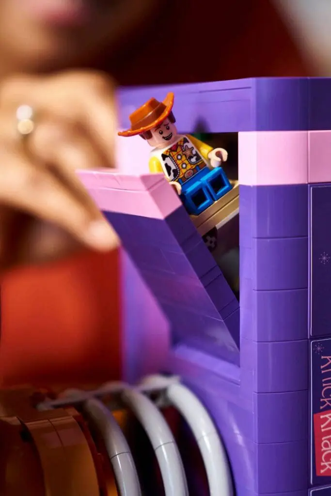 Toy cowboy figurine in purple box
