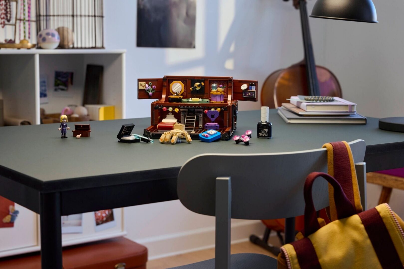Creative desk setup with small collectibles